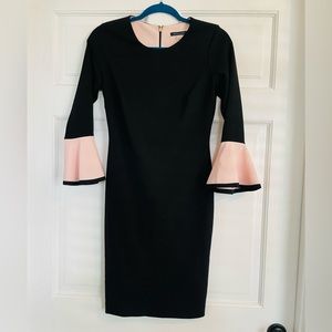 Black dress with peplum sleeves